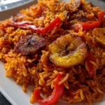 Jollof Rice Recipe Charred Pepper Pot With Plantain Coins 6 Jollof Rice Recipe Charred Pepper Pot With Plantain Coins 1762483372.0383775