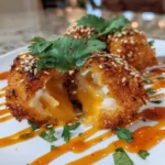 Crispy Seafood Poppers With Lime Chili Cilantro Cream Center 1772042221.4203994