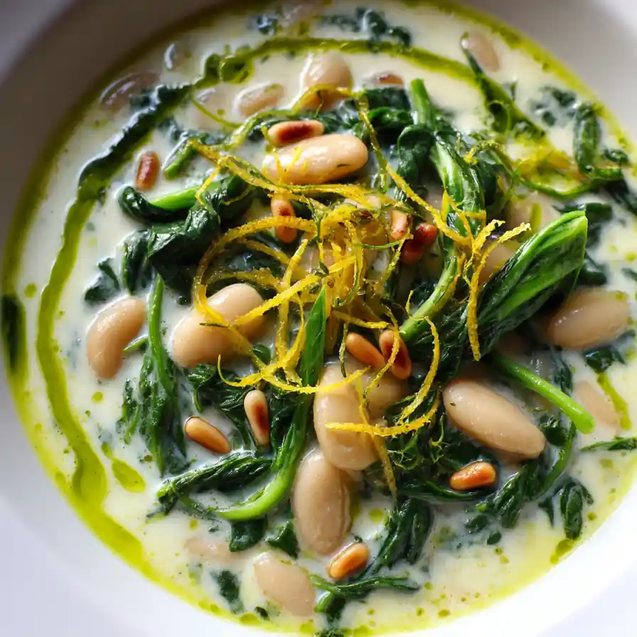 Creamy Spinach And White Bean Soup With Lemon And Pine Nut Garnish