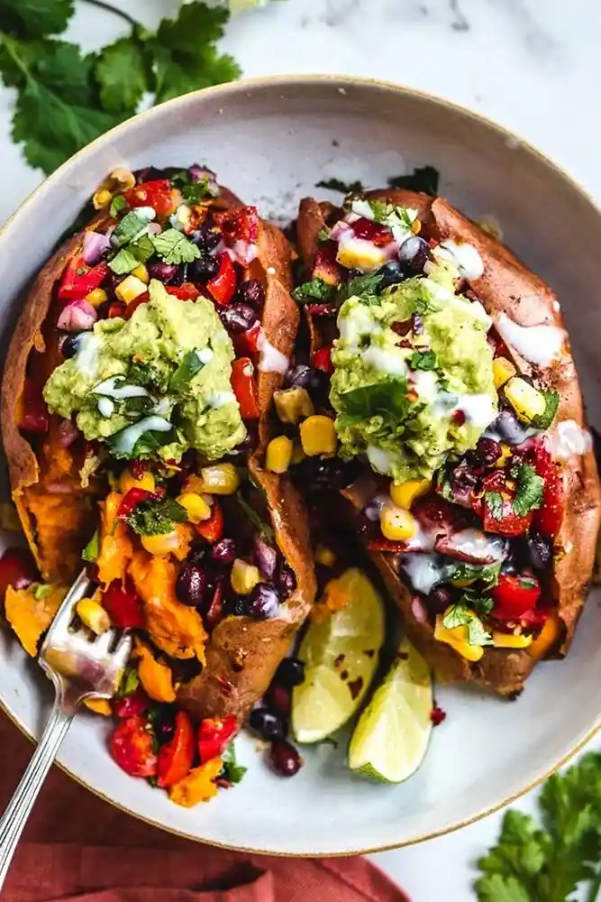 Vegan gefüllte Süßkartoffeln mit schwarzen Bohnen und Avocado 3 Recipe image