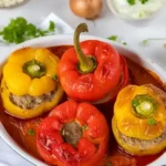 Gefüllte Paprika mit Hackfleisch und Reis in Tomatensoße 4 Gefüllte Paprika mit Hackfleisch und Reis in Tomatensoße
