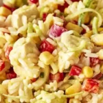 Fruchtiger Reissalat mit Hähnchen und Curry-Dressing 4 Fruchtiger Reissalat mit Hähnchen und Curry-Dressing