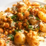 Geröstete Blumenkohl-Kichererbsen-Kartoffel-Bowl mit Tahini-Dressing 4 Geröstete Blumenkohl-Kichererbsen-Kartoffel-Bowl mit Tahini-Dressing
