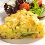 Herzhafter Zucchini-Zwiebel-Auflauf mit Parmesan 4 Herzhafter Zucchini-Zwiebel-Auflauf mit Parmesan