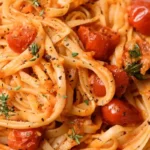 Kirschtomaten-Pasta mit Knoblauch und Basilikum 4 Kirschtomaten-Pasta mit Knoblauch und Basilikum