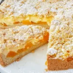 Saftiger Aprikosenkuchen mit cremiger Puddingfüllung und knusprigen Streuseln 4 Saftiger Aprikosenkuchen mit cremiger Puddingfüllung und knusprigen Streuseln