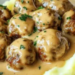 Saftige Hackbällchen in cremiger Sauce mit Kartoffelstampf 4 Saftige Hackbällchen in cremiger Sauce mit Kartoffelstampf