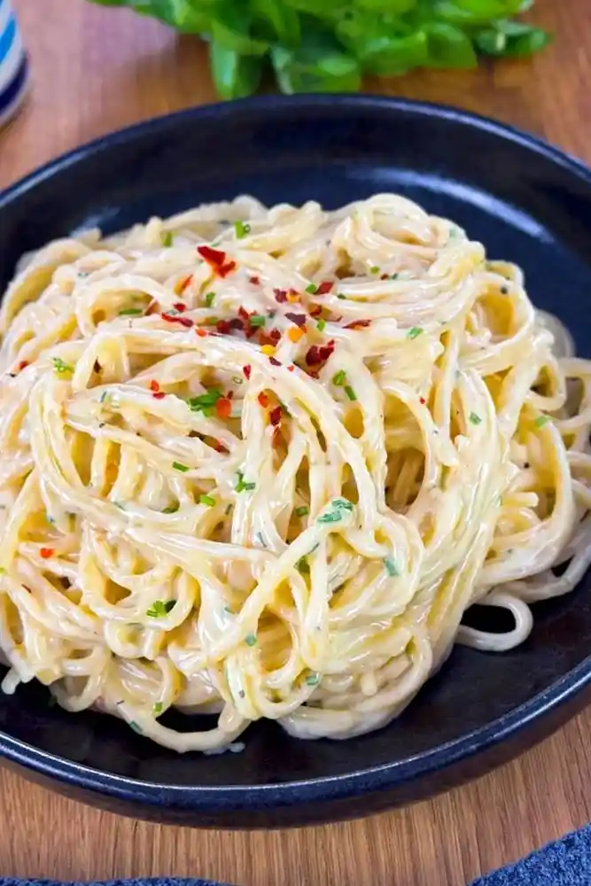 Cremige Spaghetti mit einer reichhaltigen Vier-Käse-Sauce 3 Recipe image